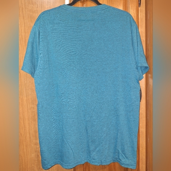 A Peanuts Snoopy short sleeve t-shirt in a size adult large. - Picture 4 of 5